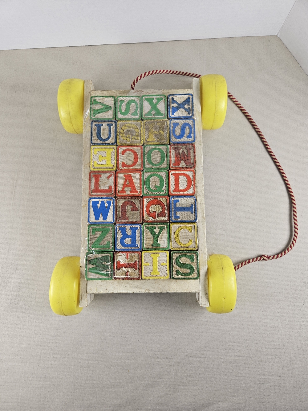 Vintage Wooden Alphabet Pull Wagon with Yellow Wheels - Multicolor Letter Blocks